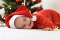 Merry christmas christmas and happy new year, infants, childhood, holidays concept - close-up 6 month old newborn Royalty Free Stock Photo