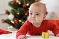 Merry christmas christmas and happy new year, infants, childhood, holidays concept - close-up 6 month old newborn baby Royalty Free Stock Photo