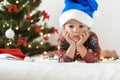 Merry Christmas and happy new year, infants, childhood, holidays concept - close-up 3 years old little funny sad kid Royalty Free Stock Photo