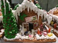 Merry Christmas and Happy New Year, little homemade icing house cookies with Santa, snowman and friend House 2 Royalty Free Stock Photo