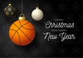 Merry Christmas and Happy New Year luxury Sports greeting card. Basketball ball as a Christmas ball on black background. Vector Royalty Free Stock Photo