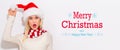 Merry Christmas and Happy New Year message with woman with Santa hat Royalty Free Stock Photo
