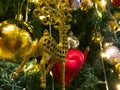Merry christmas and happy new year, This is the pine tree which is decorate with gold and red balls, yellow deer, bell and small Royalty Free Stock Photo
