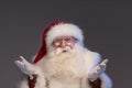 Merry Christmas and Happy New Year! Portrait of jolly Santa Claus with white beard looking at the camera, smiling. Xmas sale Royalty Free Stock Photo