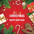 Merry Christmas and Happy New Year poster with gift box, candy stick, rocking horse, pine tree branch and holiday decor Royalty Free Stock Photo