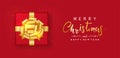 Merry Christmas and Happy New Year. Red gift box decor gold bow-ribbon, glitter golden isolated on red background. Top view. Royalty Free Stock Photo