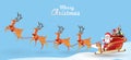 Merry Christmas and Happy New Year.Santa Claus is rides reindeer sleigh with a sack of gifts in Christmas snow scene. vector Royalty Free Stock Photo