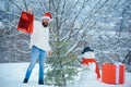 Merry Christmas and Happy new year. Christmas shop or store. Winter emotion. Snowman and funny bearded man with gift -