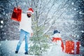 Merry Christmas and Happy new year. Christmas shop or store. Winter emotion. Snowman and funny bearded man with gift -