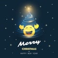 Merry Christmas and Happy New Year! -  Smiling Emoji with Christmas Tree - Card with Simple Shiny Happy Emoticon Royalty Free Stock Photo