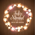 Merry Christmas and Happy New Year. Spanish Language. Glowing Lights Wreath for Xmas Holiday Greeting Card Design. Wooden Hand Dr