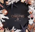 Merry Christmas and happy New Year text with decoration on black background Royalty Free Stock Photo