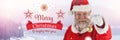 Merry Christmas Happy New Year text and Santa Claus in Winter with Christmas bauble decoration