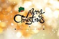 Merry Christmas and Happy New Year 2017 text on shiny gold bokeh background Royalty Free Stock Photo