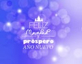 `Merry Christmas and Happy New Year` text in Spanish on bokeh Royalty Free Stock Photo