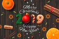 Merry Christmas, Happy New Year 2019, vintage background With Typography and spices for Christmas drink mulled wine