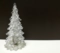 Merry Christmas and Happy New Year, white clear Xmas tree with brown background Royalty Free Stock Photo