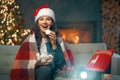 Woman watching holiday movies at home Royalty Free Stock Photo