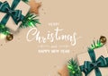 Merry Christmas and Happy New Year. Xmas background composition decorated with Gift box, Pine tree, star, and sparkling light. Royalty Free Stock Photo