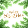 Merry Christmas holiday greeting card background template of golden text hand drawn calligraphy in Christmas tree fir branch frame Royalty Free Stock Photo