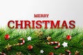 Merry Christmas. Holidays Background with Season Wishes and Border of Realistic Looking Christmas Tree Branches Decorated with