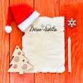 Merry christmas letter with santa hat Royalty Free Stock Photo