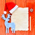 Merry christmas letter with santa hat Royalty Free Stock Photo