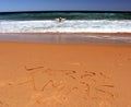 Merry Christmas lettering on the beach. Royalty Free Stock Photo