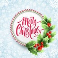 Merry Christmas lettering in circle candy cane frame Royalty Free Stock Photo