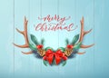 Vector merry christmas lettering horns bow holly Royalty Free Stock Photo