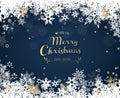 `Merry Christmas` with lots of snowflakes on blue background Royalty Free Stock Photo