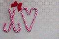 Merry Christmas Love symbol of hard stick candy and bow Royalty Free Stock Photo