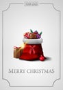 Merry Christmas, modern vertical silver postcard with vintage frame of lines and Santa Claus bag with presents Royalty Free Stock Photo