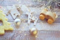 Merry Christmas, New Year decorations, balls, illumination on a light wooden table against the background of a window Royalty Free Stock Photo