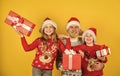 Merry Christmas. new year shopping. time for presents. happy family celebrate xmas. small girls exchange gifts with Royalty Free Stock Photo