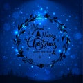 Merry Christmas and New Year typographical on blue holiday background with Christmas wreath, landscape, snowflakes, light, stars. Royalty Free Stock Photo