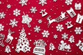 Merry Christmas pattern made of white decorations wooden isolated on red background Royalty Free Stock Photo