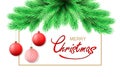 Merry Christmas postcard with fir tree branch and Christmas decorations, white background. Royalty Free Stock Photo