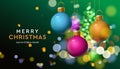 Merry Christmas sale banner with colorful baubles sparkle in blur bokeh effect green background Royalty Free Stock Photo