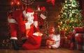 Merry Christmas! santa claus and child girl at night at the Chr Royalty Free Stock Photo