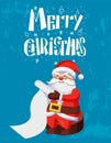 Merry Christmas, Santa Claus Reading Wish List Royalty Free Stock Photo