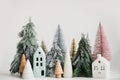 Merry Christmas! Christmas scene, miniature holiday village. Christmas little houses and trees Royalty Free Stock Photo