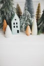 Merry Christmas! Christmas scene, miniature holiday village. Christmas little houses and trees Royalty Free Stock Photo