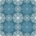 Merry Christmas. Seamless pattern with snowflakes on a blue background. Royalty Free Stock Photo