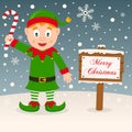 Merry Christmas Sign with a Green Elf Royalty Free Stock Photo