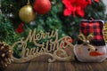 Merry Christmas sign with Christmas tree decorations. Christmas background Royalty Free Stock Photo