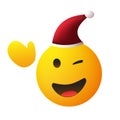 Merry Christmas! - Smiling and Winking Yellow Emoji with Red Santa Hat and Waving Hand - Simple Shiny Happy Emoticon Royalty Free Stock Photo