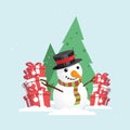 Merry Christmas Snowman with a gift box in snowy winter. Royalty Free Stock Photo