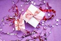 Merry Christmas or St Valentines Day card made of decorations, white gift boxes with pink ribbon, sparkles and confetti Royalty Free Stock Photo