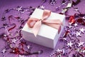 Merry Christmas or St Valentines Day card made of decorations, white gift boxes with pink ribbon, sparkles and confetti Royalty Free Stock Photo